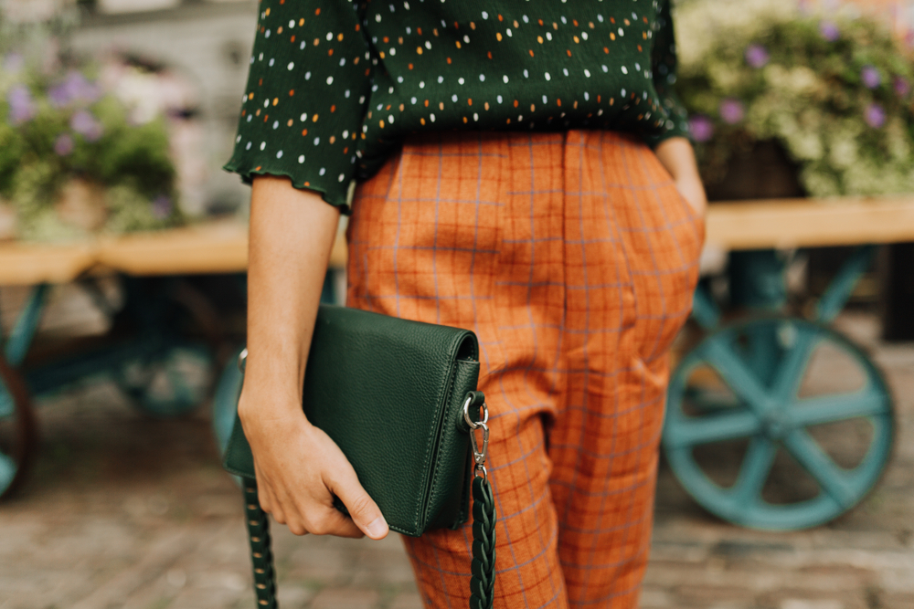 woman holding small bag