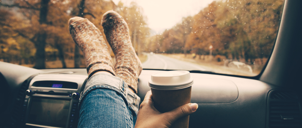 Woman with Travel Mug